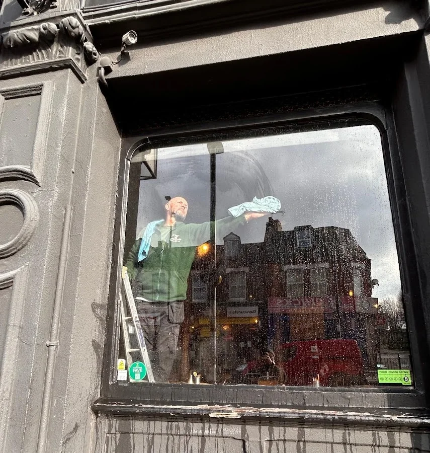 Interior window cleaning — close-up of streak-free finish